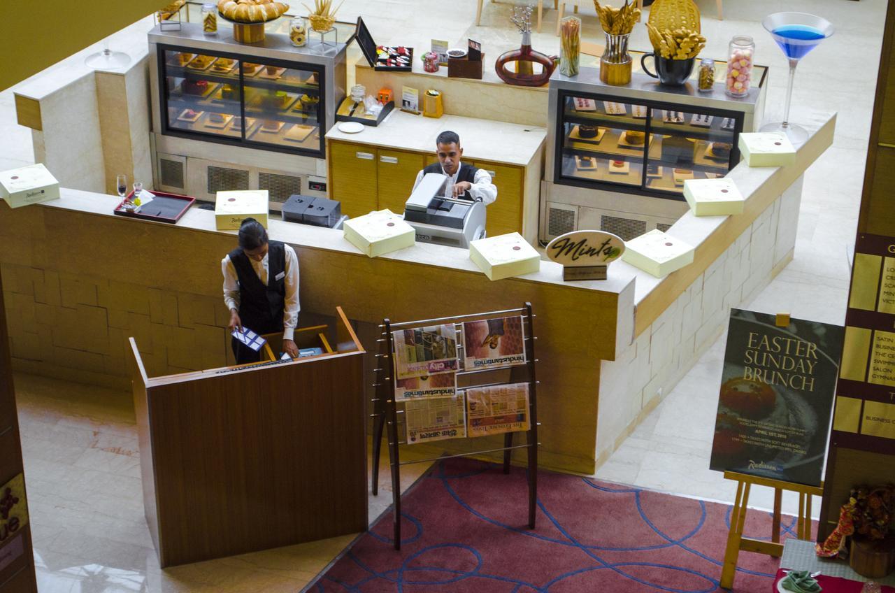 Radisson Blu Hotel, Большая Нойда Экстерьер фото Concierge desk at the Taj Mahal Palace, Mumbai, India